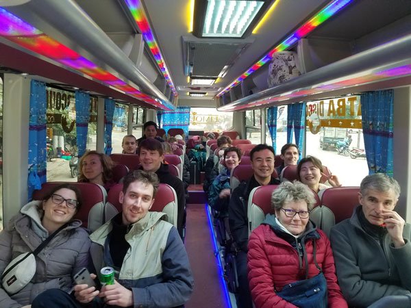Luxco Travels - Happy passengers on 35-seater shuttle bus from Hanoi to Halong Bay