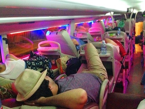 Sleeping bus interior with leather seats and modern amenities on the Dragon Sleeping bus from Hanoi to Sapa