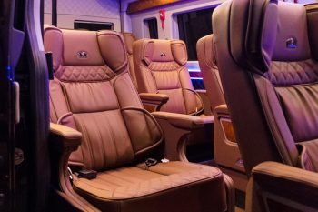 Luxurious Limousine van 10 seats interior with leather seats and modern amenities on the Sapa King Limousine company from Hanoi to Sapa