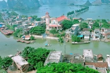 Van Long – Kenh Ga floating village tour Vietnam LuxcoTravels river cruise cultural exploration