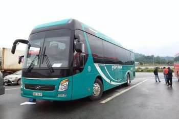Sleeping bus interior with leather seats and modern amenities on the Dragon Sleeping bus from Hanoi to Sapa