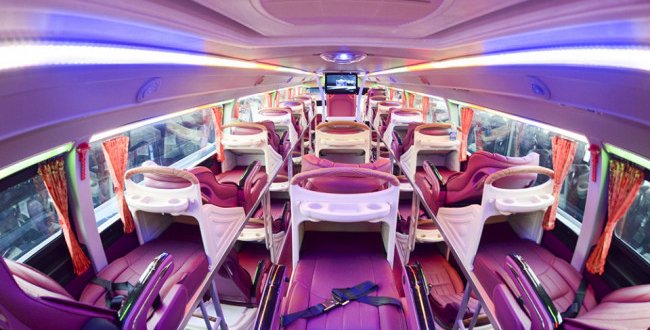 Sleeping bus interior with leather seats and modern amenities on the Dragon Sleeping bus from Hanoi to Sapa